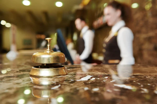depositphotos_53556525-stock-photo-hotel-reception-with-bell